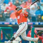 Three games, three homers for Suzuki